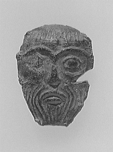 FRAGMENT D'ENSEIGNE DE PELERINAGE : TETE D'HOMME BARBU