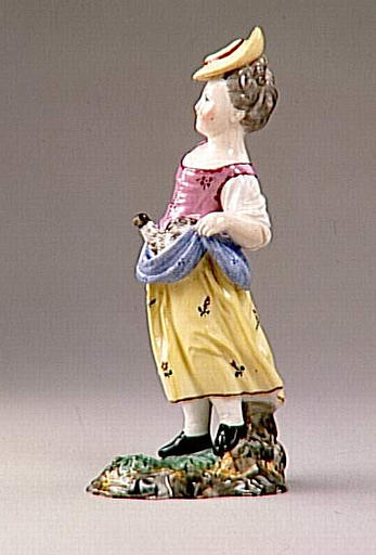 Paysanne tenant une poule