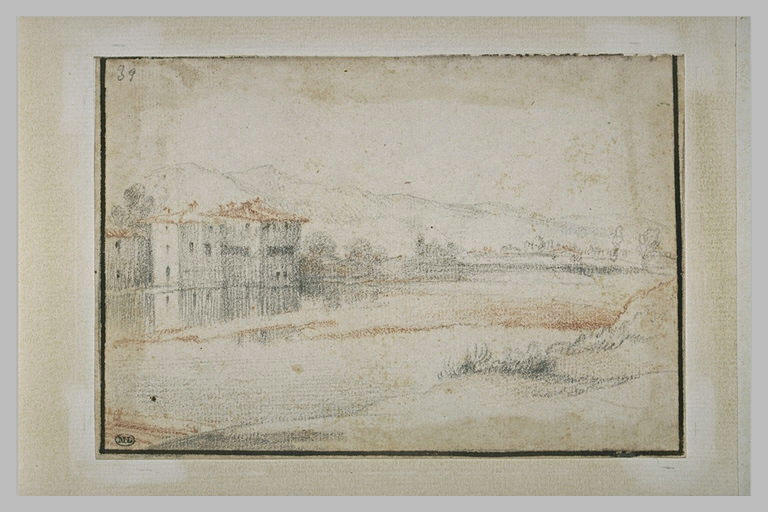 Paysage avec maisons au bord d'une rivière