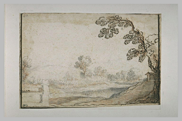 Paysage avec un arbre à droite et un mur à gauche