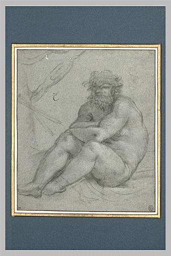 Homme nu, assis à terre, les bras croisés