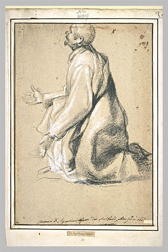 Homme à genoux regardant en haut