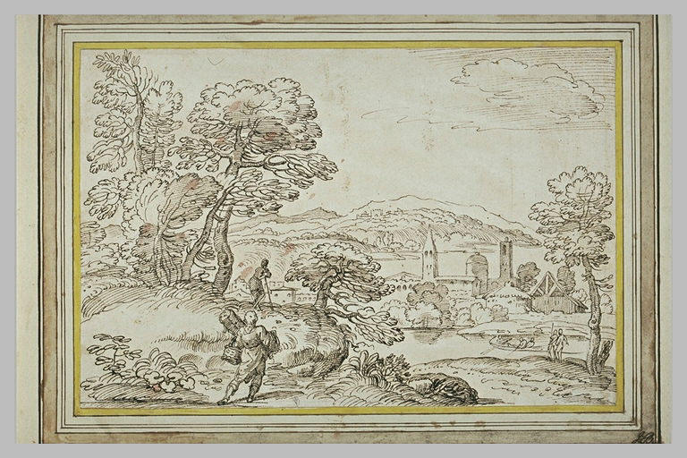 Paysage de campagne montagneux et boisé, avec une bourgade