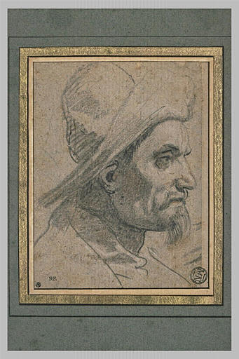 Tête d'homme coiffée d'un chapeau à large bords