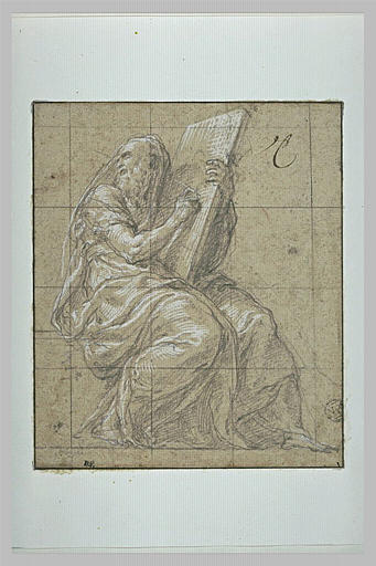 Prophète écrivant sur une grand tablette posée sur ses genoux