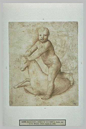 Enfant jouant avec un agneau