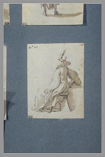 Un personnage de théâtre assis sur un banc