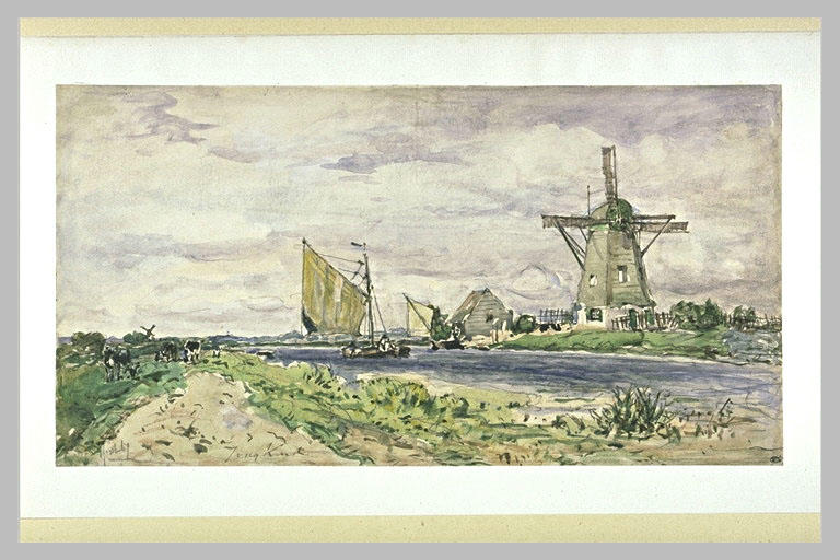 Moulin près d'un canal en Hollande