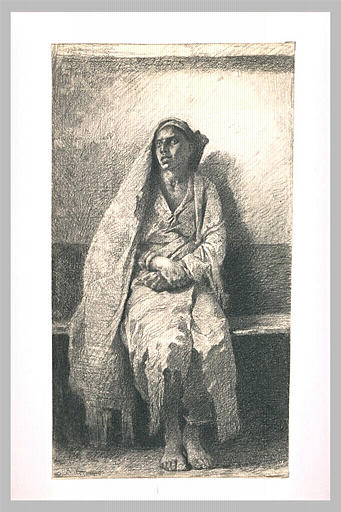 Jeune arabe, de face, assis sur un banc, les mains croisées