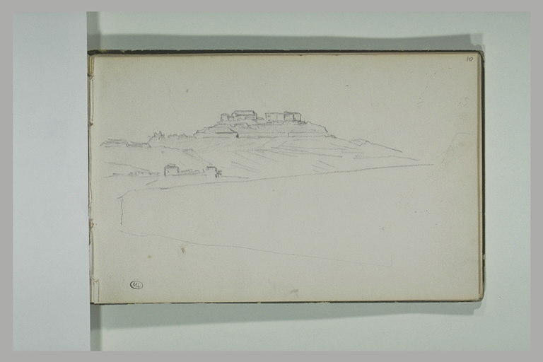 Paysage avec un village au sommet d'une colline