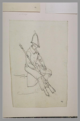 Gendarme assis, son fusil entre les jambes