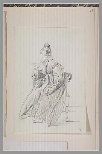 Femme assise sur un fauteuil, lisant