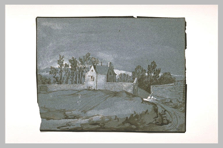 Maison dans un jardin clos de murs