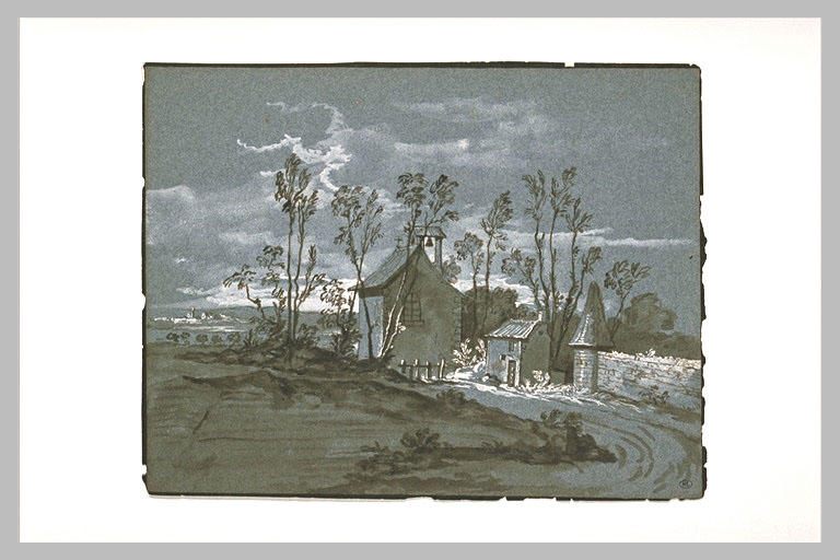 Chapelle et maisons au bord d'une route