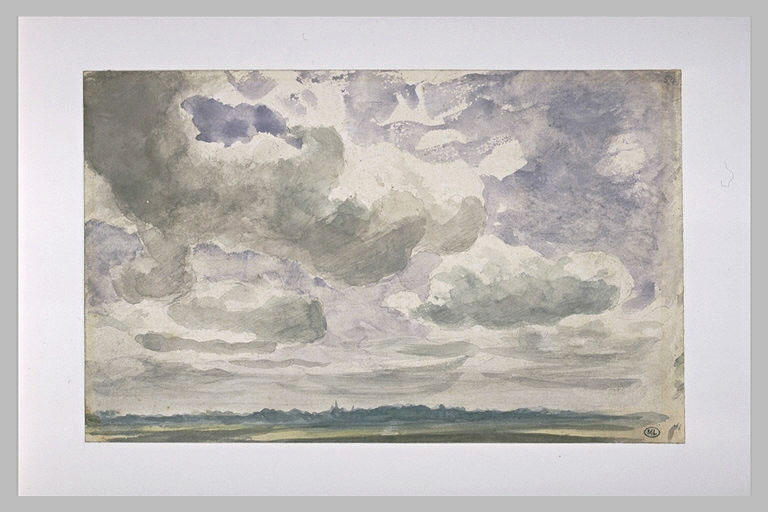 Paysage avec de gros nuages blancs et gris dans le ciel
