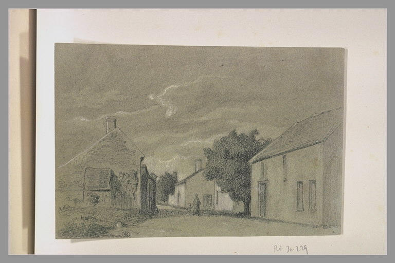 Rue de village avec femme et enfant