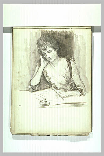 Femme assise à une table, une plume à la main