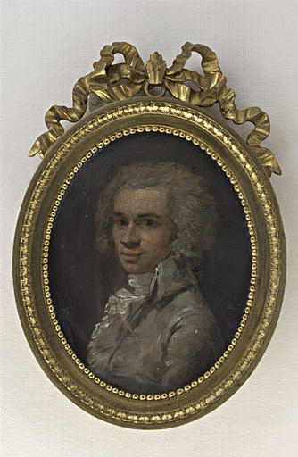 Portrait d'homme, en buste, en costume gris