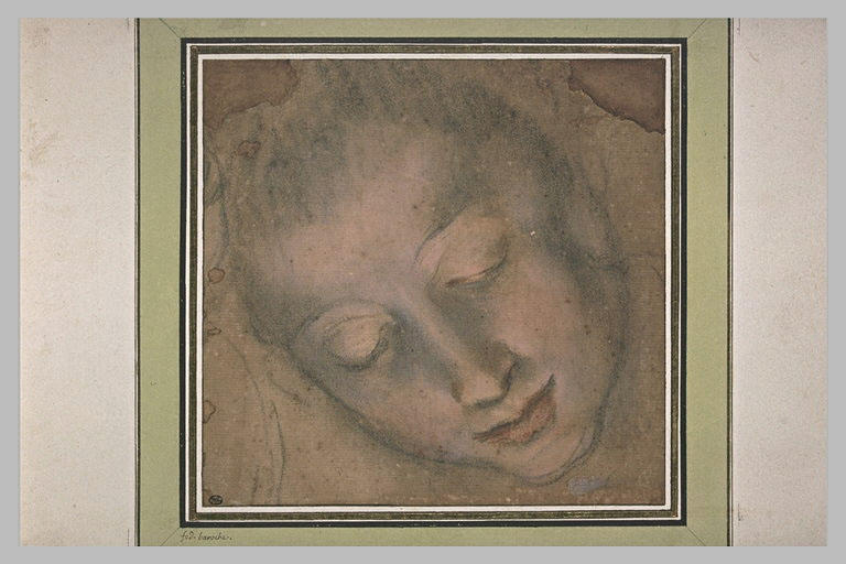 Tête de femme, les yeux baissés