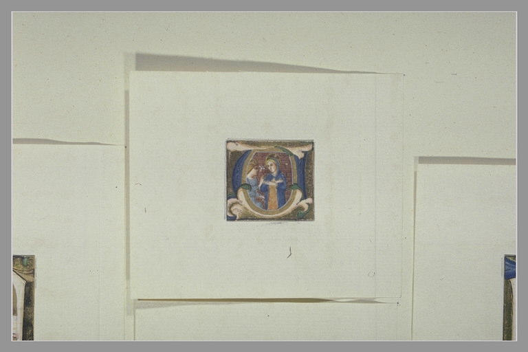 Lettre majuscule U avec l'Annonciation