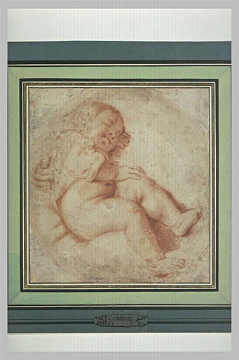 Figure d'enfant endormi et une main