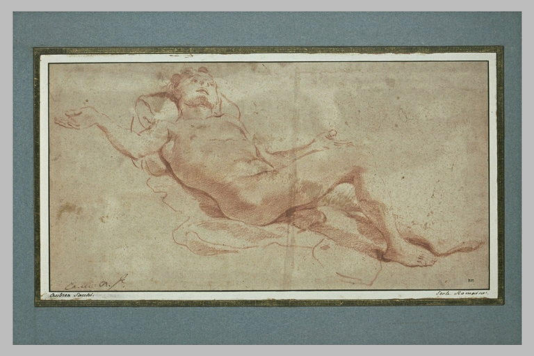 Un homme couché, les bras étendus