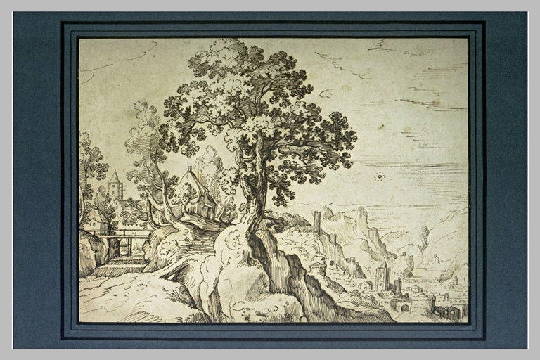 Paysage montagneux avec une ville au bord d'une rivière