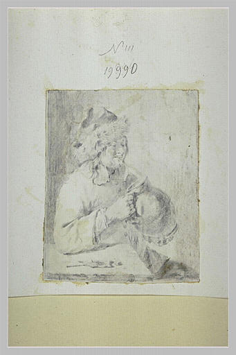 Homme s'apprêtant à boire dans un pichet