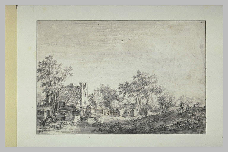 Vieille ferme et ses dépendances au bord d'un cours d'eau