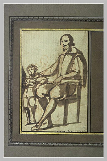 Homme assis et un enfant debout à côté de lui