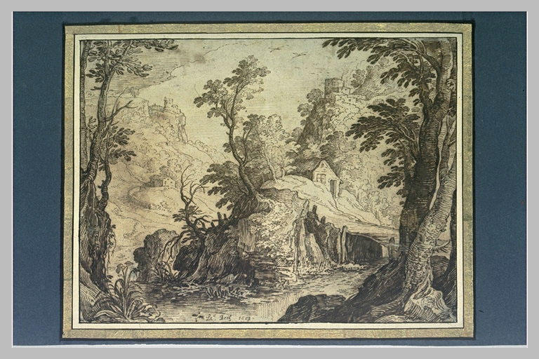 Ruisseau au fond d'une vallée avec des maisons