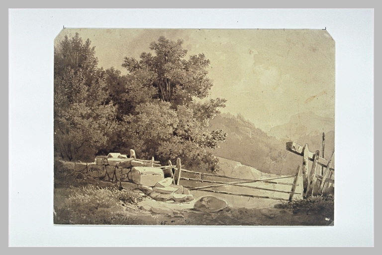 Paysage avec muret et barrière