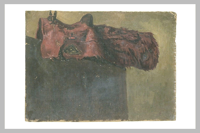 Selle orientale en cuir rouge décoré, et tapis de croupe