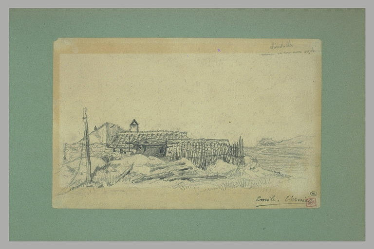 Maisons et bâtiment à toit de tuile et muret de pierre