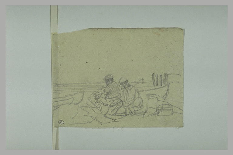 Deux hommes réparant des filets