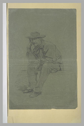 Homme coiffé d'un large feutre