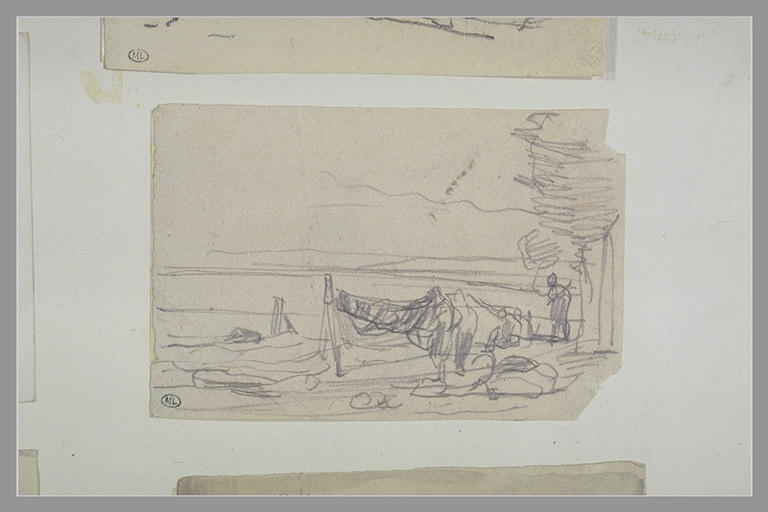 Hommes près de filets séchant