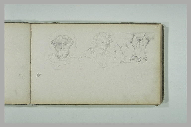 Deux visages de saints et motifs décoratifs