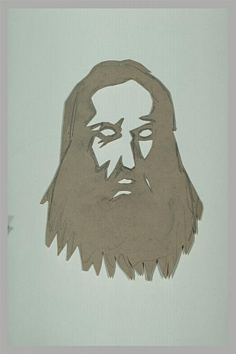 Pochoir découpé en forme de tête d'homme barbu