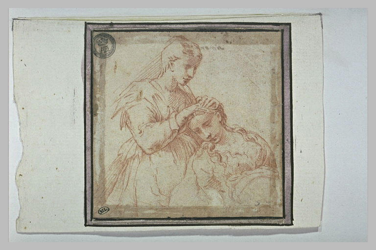 Une femme peignant une autre femme