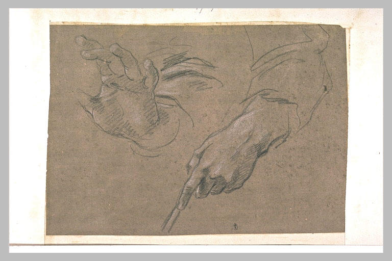 Une main ouverte et une autre posée sur un bâton