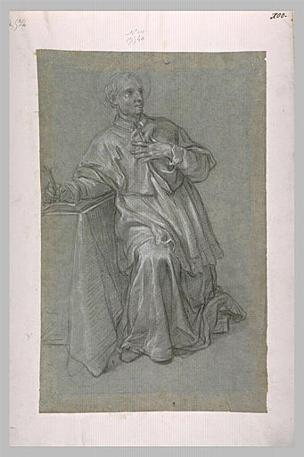 Un saint prêtre assis près d'une table avec un livre semblant écrire