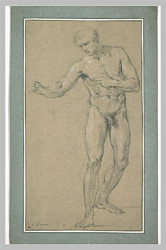 Homme debout, vu de face, regardant vers la terre