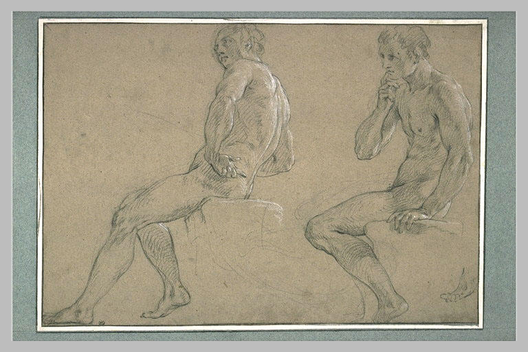 Deux hommes assis sur un bloc de pierre