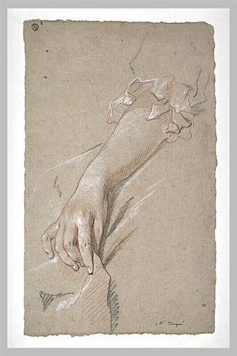 Main de femme, avec l'avant-bras, tenant un objet