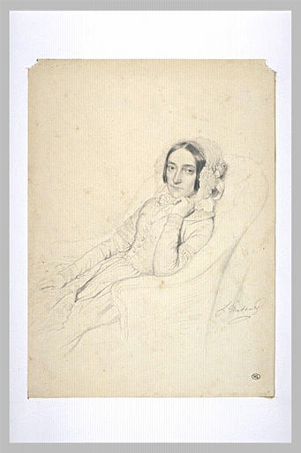 Portrait de femme assise dans un fauteuil