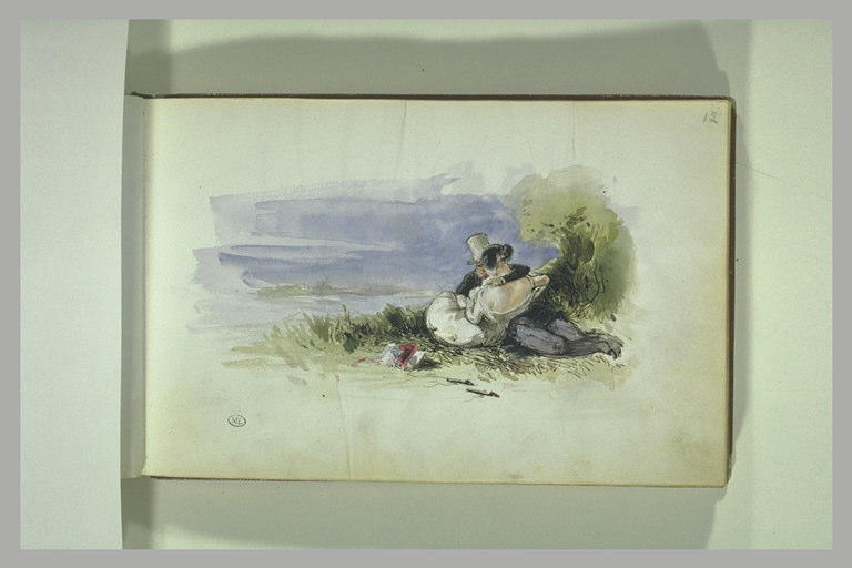 Couple allongé au brod de l'eau