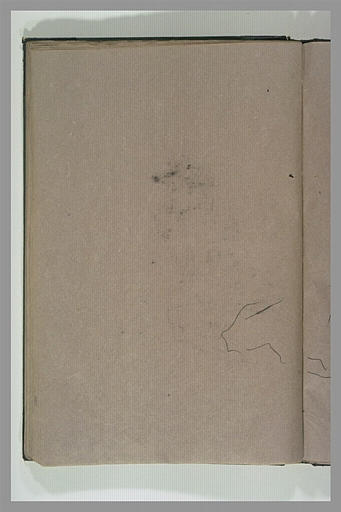 Femme assise en tailleur, à terre