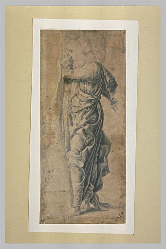 Saint Jean debout, de profil à gauche, les mains jointes