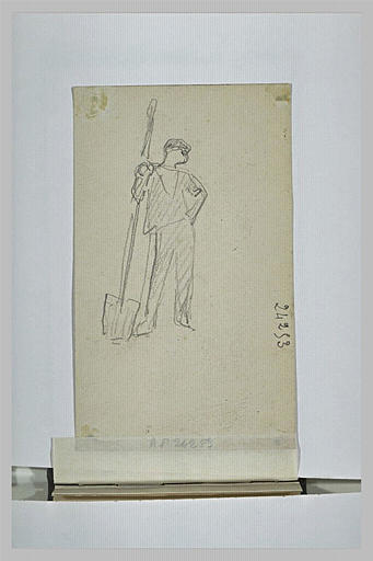 Homme debout, appuyé sur une pelle